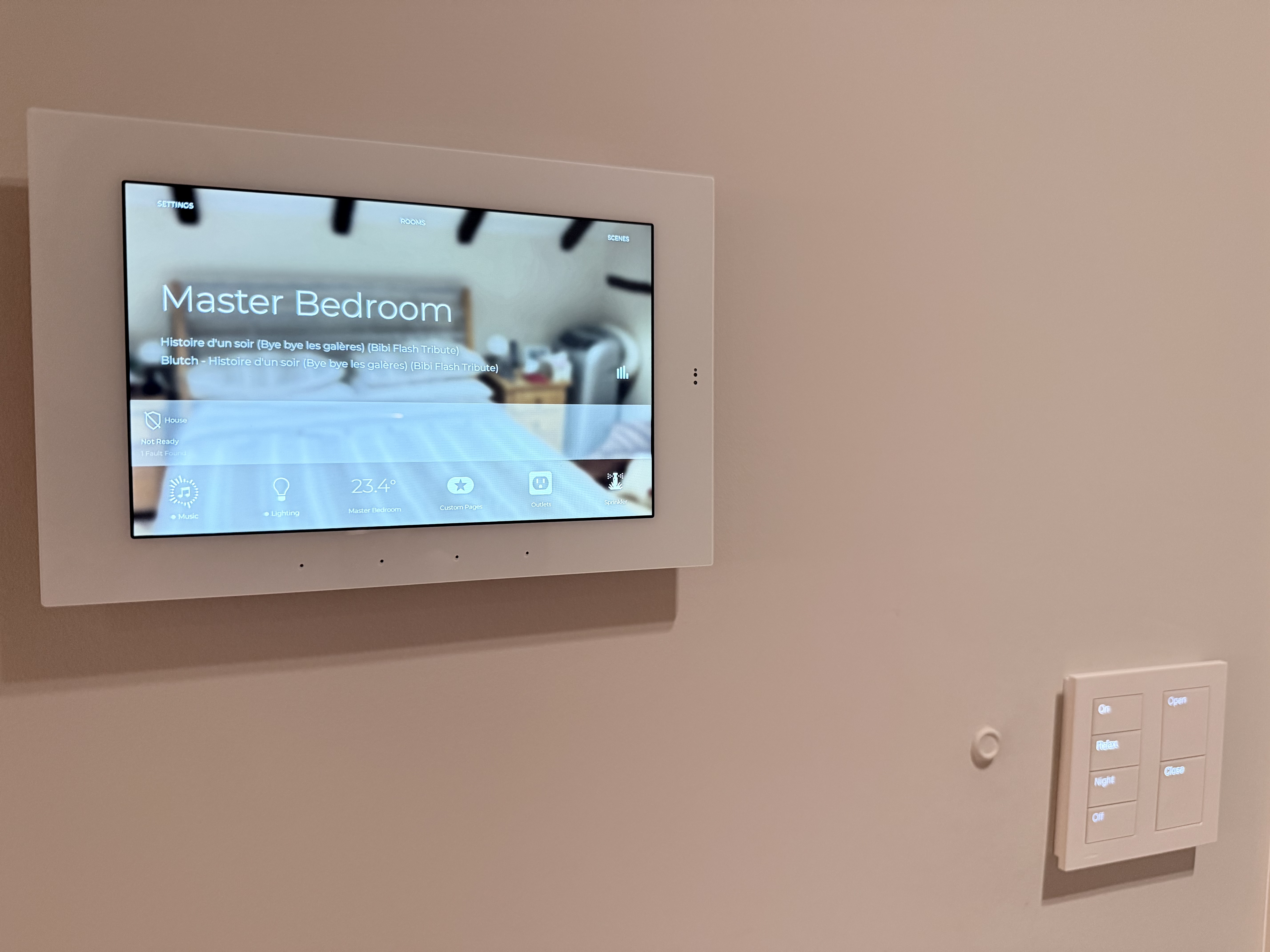 Savant touchscreen and Lutron keypad installed in a smart home
