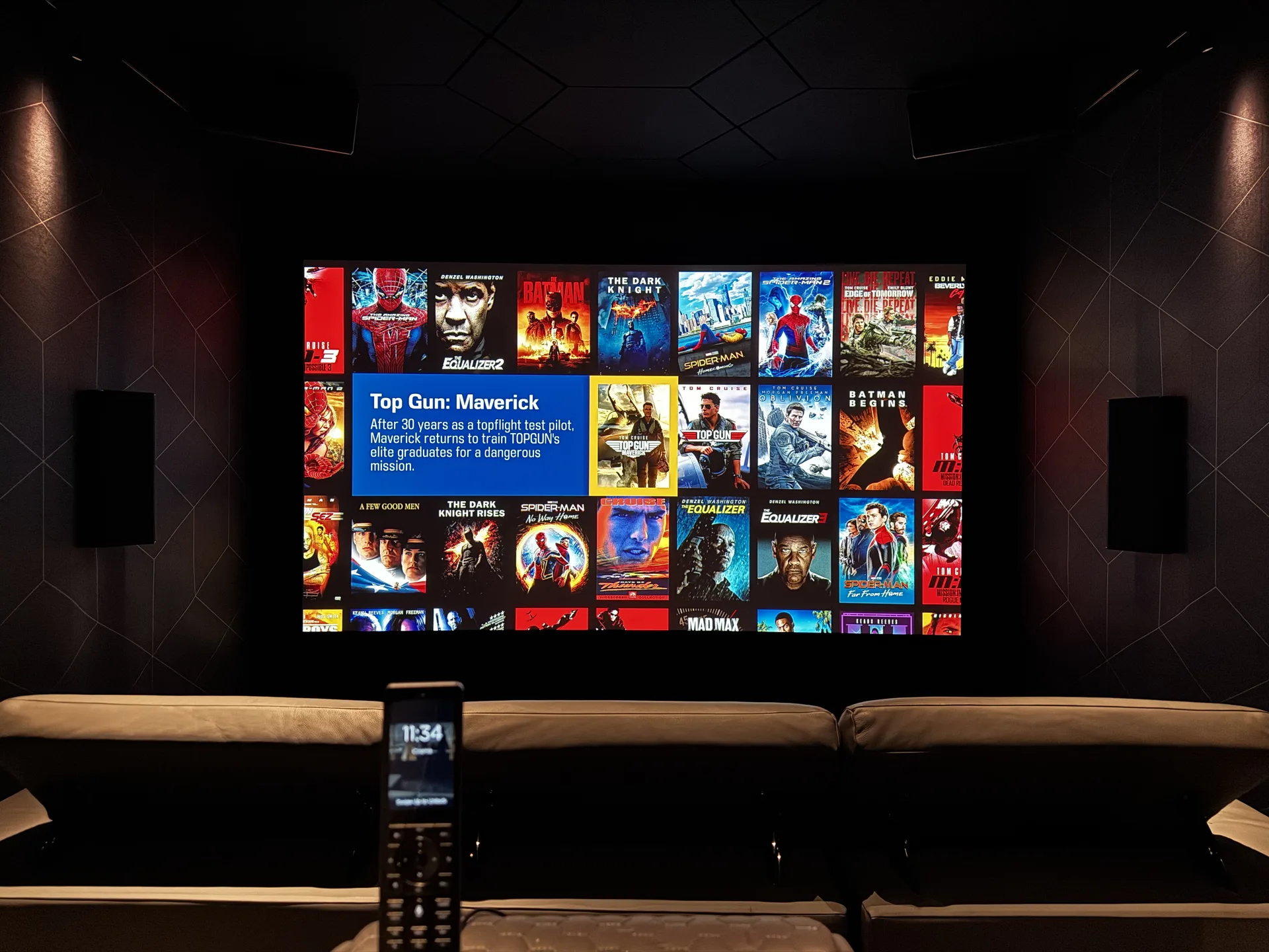 Dedicated home cinema room with custom acoustic panels and 4K laser projection